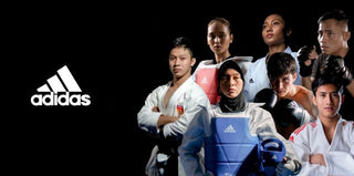 Karatepak Adidas Kumite Adilight Primegreen WKF Blauwe Strepen 